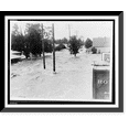 thumbnail image 1 of Historic Framed Print, [Floodwaters rush through town partially submerging buildings, trees, and utility poles], 17-7/8" x 21-7/8", 1 of 9