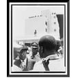 thumbnail image 1 of Historic Framed Print, [Francois Duvalier (center) surrounded by soldiers at the dedication of the new building to house the tax department], 17-7/8" x 21-7/8", 1 of 9