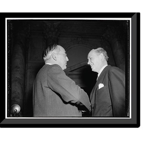 Historic Framed Print, Hopkins and Chief Questioner at Senate Commerce hearing. Washington, D.C., Jan. 11. The smile on the face of Secretary of Commerce Harry Hopkins, shown talki, 17-7/8" x 21-7/8"