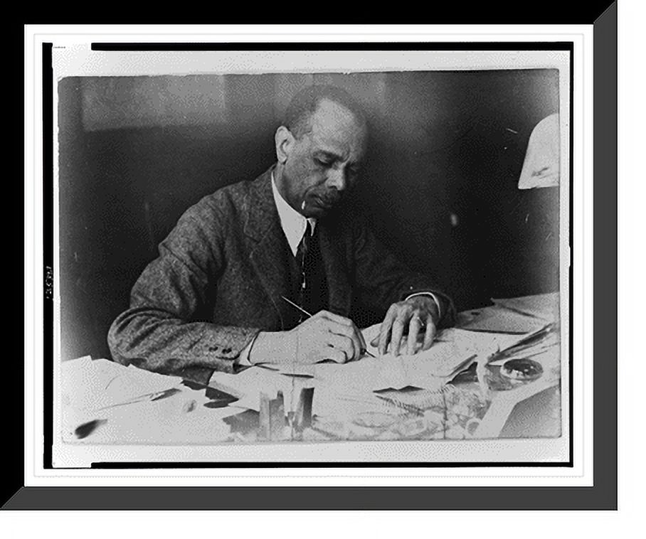 Historic Framed Print, [James Weldon Johnson, half-length portrait, seated at desk, holding pen ...