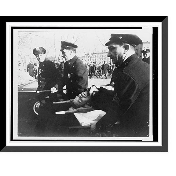 Historic Framed Print, [Malcolm X on stretcher carried by New York policemen following assassination at rally], 17-7/8" x 21-7/8"