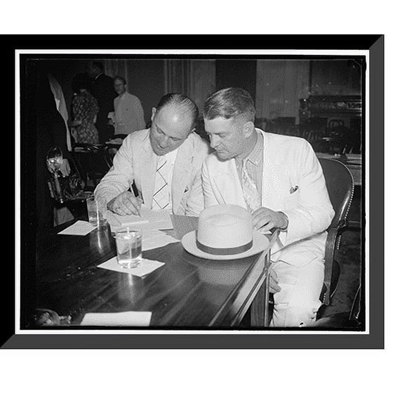 Historic Framed Print, Marooni, city policeman of Canton, Ohio. Walter P. Koeller, city policeman of Canton, Ohio testifying before the La Follette Civil Liberties Committee, 17-7/8" x 21-7/8"