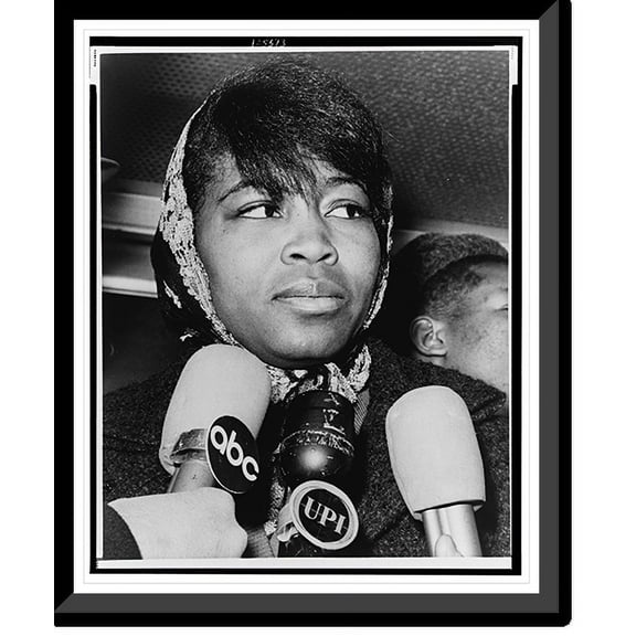 Historic Framed Print, [Mrs. Betty Shabazz, bust portrait, facing right, leaving Bellevue Hospital morgue after identifying the body of her slain husband, Malcolm X, New York City], 17-7/8" x 21-7/8"