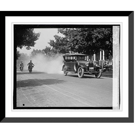 Historic Framed Print, [Police on motorcycle trailing car with smoke], 9/1/23 - 2, 17-7/8" x 21-7/8"