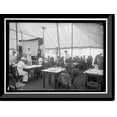 thumbnail image 1 of Historic Framed Print, RED CROSS, AMERICAN. WOMEN'S NATIONAL SERVICE SCHOOL; RED CROSS INSTRUCTIONS IN CARE OF SICK. BANDAGING, 17-7/8" x 21-7/8", 1 of 9