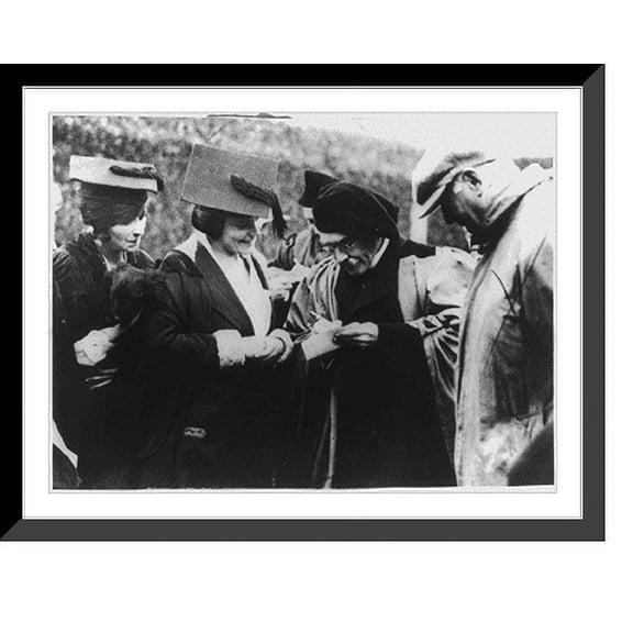 Historic Framed Print, [Rudyard Kipling signing autographs for student girls - St. Andrews], 17-7/8" x 21-7/8"