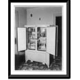 thumbnail image 1 of Historic Framed Print, [Servel refrigerator, with doors open, in an officer's quarters at Fort Lewis, Washington, March 28, 1938], 17-7/8" x 21-7/8", 1 of 9
