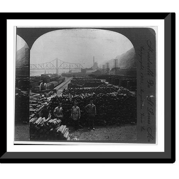 Historic Framed Print, Stock yards showing cords of pig iron, blast furnace, Pittsburg, Pa., 17-7/8" x 21-7/8"