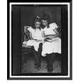 thumbnail image 1 of Historic Framed Print, [Two girls wearing white dresses and dark stockings reading a book] - 2, 17-7/8" x 21-7/8", 1 of 9