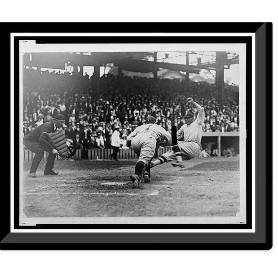 Historic Framed Print, [Umpire ready to make the call as catcher lunges to apply tag to Washington ball player sliding into home plate during baseball game], 17-7/8" x 21-7/8"