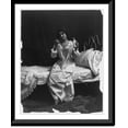 thumbnail image 1 of Historic Framed Print, [Woman seated on bed and taking spoonful of medicine], 17-7/8" x 21-7/8", 1 of 9