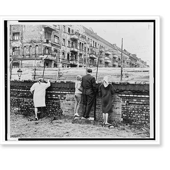 Historic Print, A group of West Germans peer over the infamous Berlin Wall (...), 18" x 24"