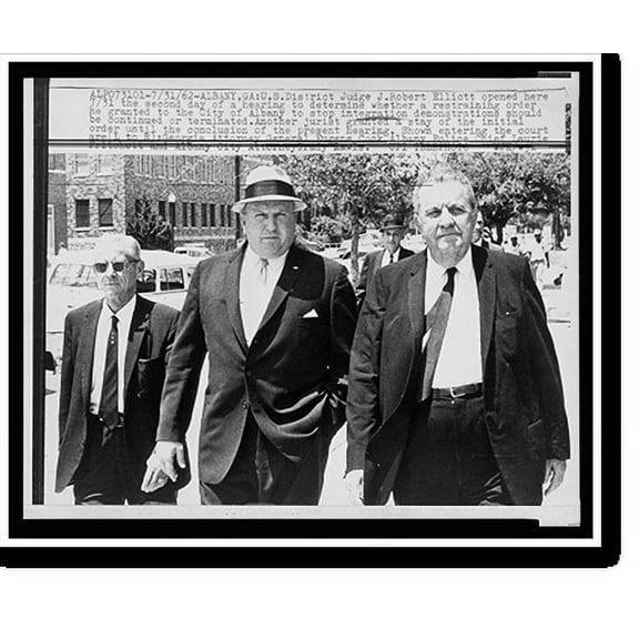 Historic Print, [About to enter an Albany, Georgia court are (l to r) Georgia Attorney General Eugene Cook, Albany Police Chief Laurie Pritchett and City Attorney Grady Rawls], 16" x 20"