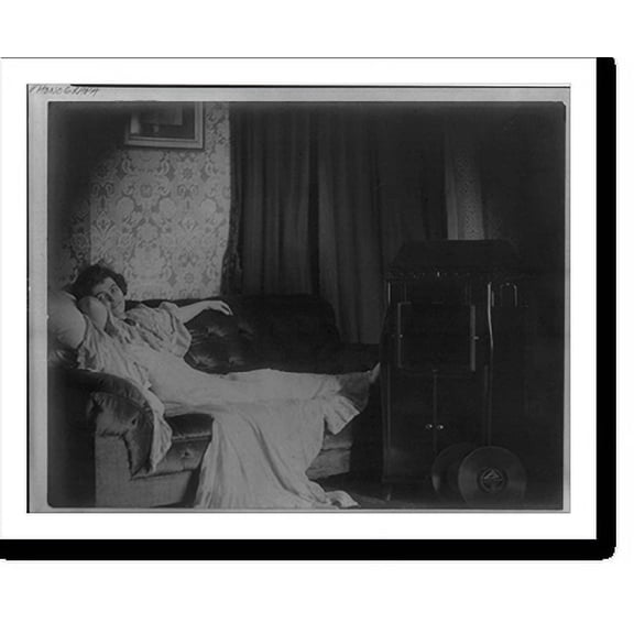 Historic Print, [Advertisement for RCA Victor]: Woman reclining on sofa, by phonograph, 16" x 20"