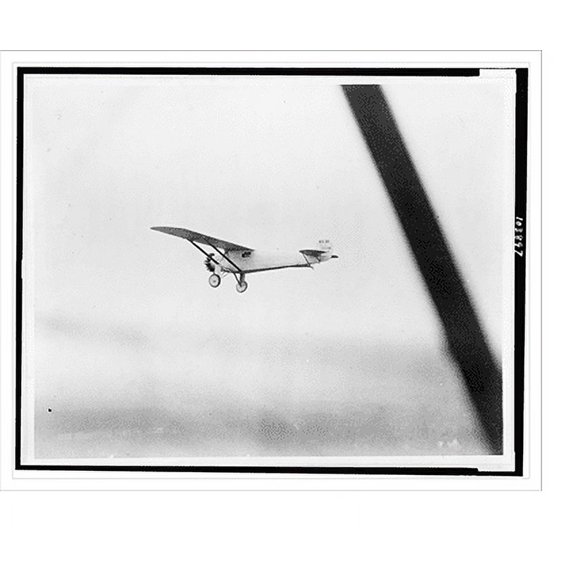 Historic Print, [Aerial view of Charles Lindbergh's airplane, the Spirit of St. Louis, in flight], 18" x 24"
