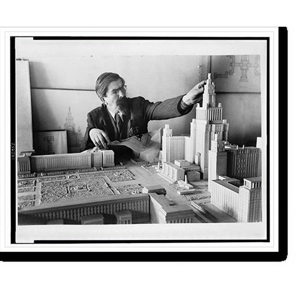 Historic Print, [Architect Lev Rudnev, leader of group of architects awarded Stalin prize for design of Moscow State University building, with model of the building], 18" x 24"