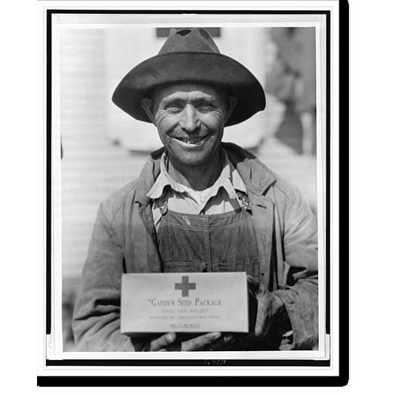 Historic Print, Arkansas farmer, half-length portrait, holding Red Cross garden seed package], 16" x 20"