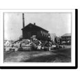 Historic Print, [Bales of cotton in front of a cotton gin, Corpus