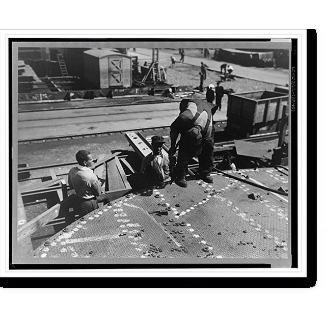 Historic Print, Baltimore, Maryland. Tightening bolts with a pneumatic