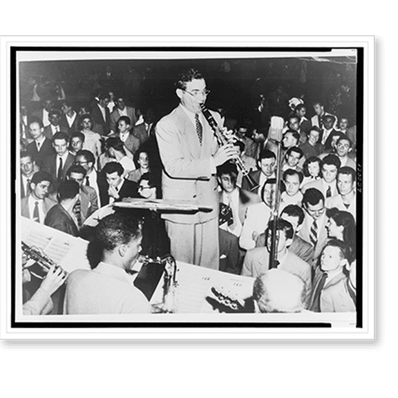 Historic Print, [Benny Goodman, standing, playing clarinet, admirers look and listen, other bandmembers in foreground], 16" x 20"