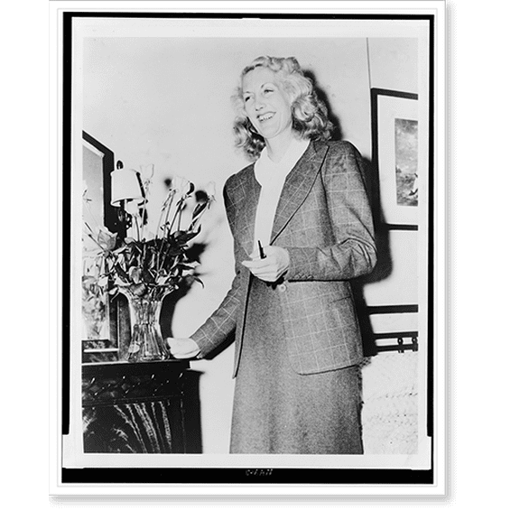 Historic Print, [Beryl Markham, three-quarter length portrait, standing, facing left], 16" x 20"