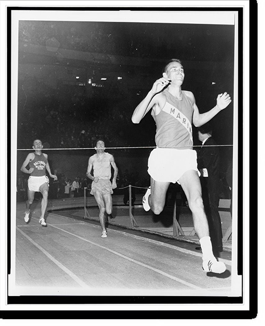 Historic Print, [Billy Mills at finish of threemile run in track meet