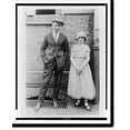 thumbnail image 1 of Historic Print, Bobbed-hair girl and husband pose for camera after pleadi[ng]..., 16" x 20", 1 of 3