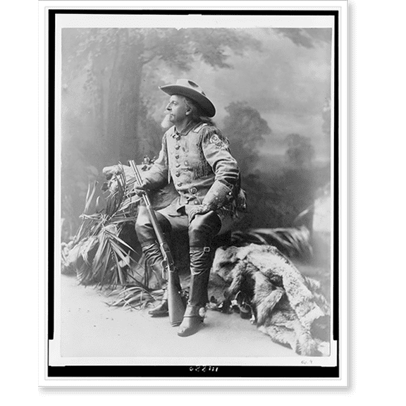 Historic Print, [Buffalo Bill Cody, full-length portrait, seated, facing left, holding rifle], 18" x 24"