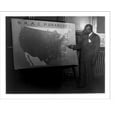 Historic Print, [Carl R. Johnson pointing to a map of the U.S. showing