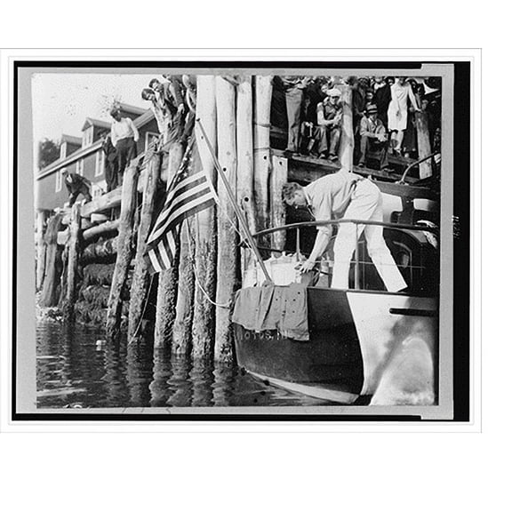 Historic Print, [Charles Lindbergh on small boat dockside], 16" x 20"