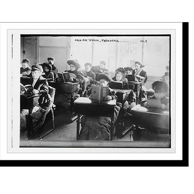 Historic Print, Children reading at desks in room of open air school