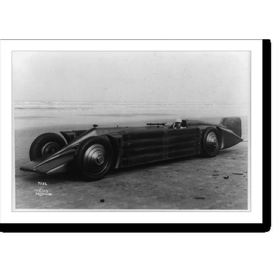 Historic Print, [Driver seated in long racing car on beach], 16" x 20"