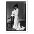 thumbnail image 1 of Historic Print, [Edith Kermit Carow Roosevelt, full-length portrait, standing, facing left, with arm around young Quentin Roosevelt, who is seated on back of chair], 18" x 24", 1 of 3