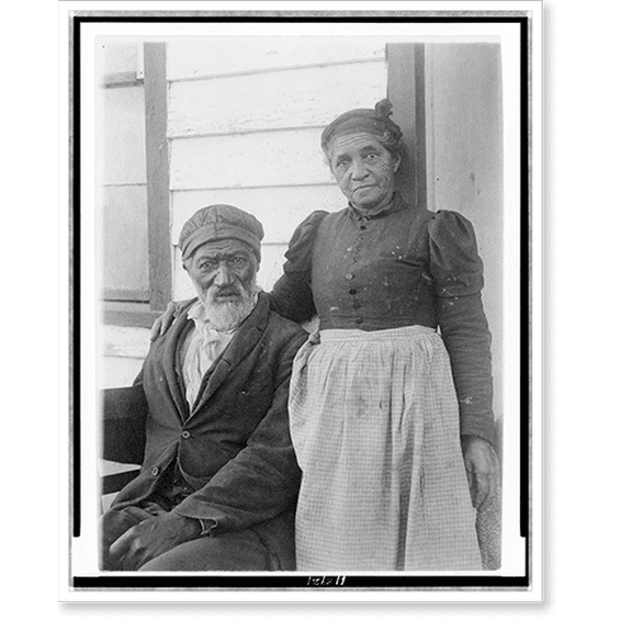 Historic Print, [Elderly African American couple posed outside of building, near Hampton Institute, Hampton, Va.], 16" x 20"