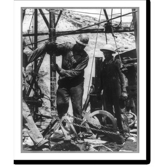 Historic Print, Electric logging. Men lowering electrode into the hole at a Carter Oil Co. well, Elk Basin, Wyo., 16" x 20"