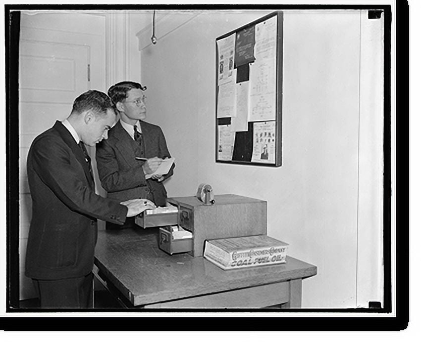 Historic Print, Employees of the Secret Service checking over bulletin