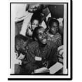 thumbnail image 1 of Historic Print, [Ernest Green, head-and-shoulders portrait, shows textbooks to young African American children, after his first full day at Little Rock Central High School], 16" x 20", 1 of 3