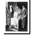 thumbnail image 1 of Historic Print, Ethel Barrymore acts as saleslady at the Christmas Seal booth in Washington, D.C. With Miss Barrymore are Miss Carlia(?) Campbell and Mrs. Sidney Thomas, leaders in last…16" x 20", 1 of 3
