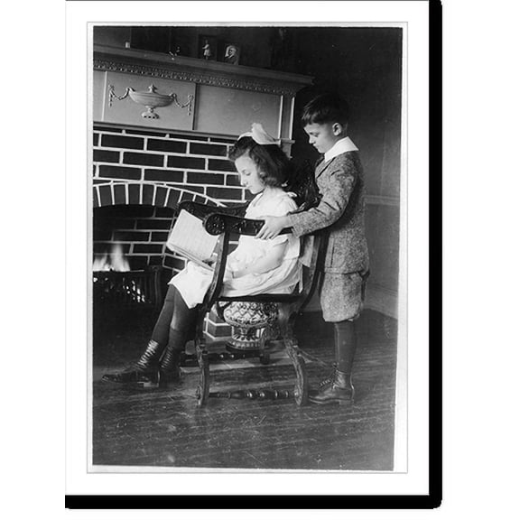 Historic Print, Evora and Porfirio Bonet [looking at book in front of fireplace], 16" x 20"