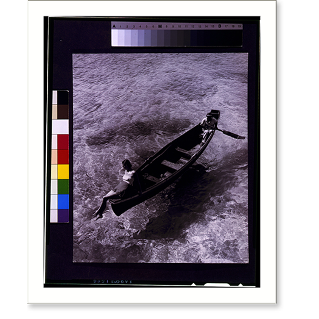 Historic Print, [Fashion model on edge of boat, man rowing, Montego Bay