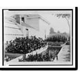 Historic Print, [Flower beds, greenhouse, and building at the home of