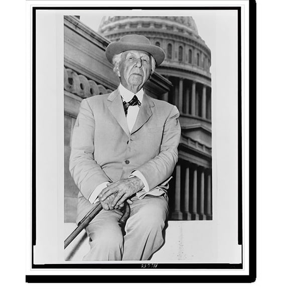 Historic Print, [Frank Lloyd Wright, three-quarter length portrait, seated, facing front, outside the U.S. Capitol building], 16" x 20"