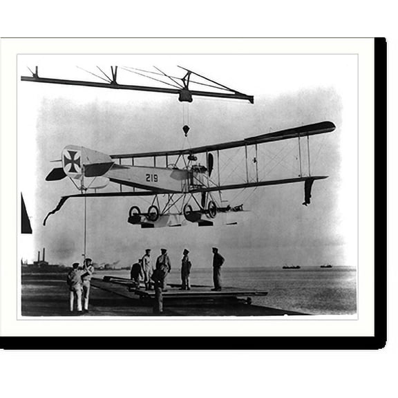 Historic Print, German sea plane being lowered by crane onto water, 16" x 20"