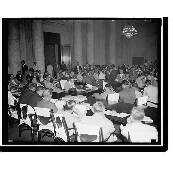 Historic Print, Girdler takes oath. Washington, D.C., June 24. Tom Girdler, Board Chairman of the Republic Steel Corporation, being sworn in as he took the stand today before the Senate...18" x 24"