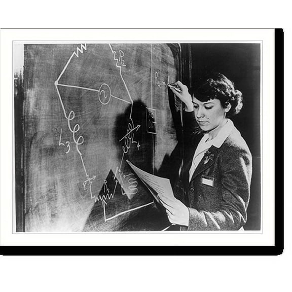 Historic Print, [Girl Electrical Engineer Works out Problem. Half-length portrait, standing, facing left, at blackboard], 18" x 24"