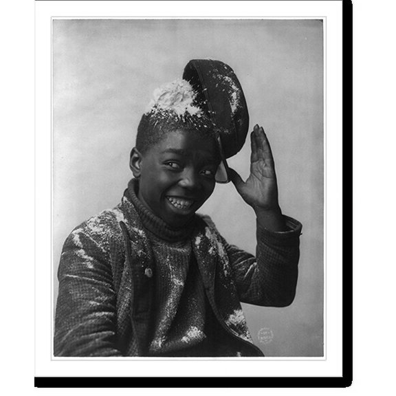 Historic Print, [Grinning African American boy with hat knocked askew by snowball], 18" x 24"