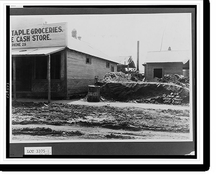 Historic Print, [Grocery store and other buildings with flood damage