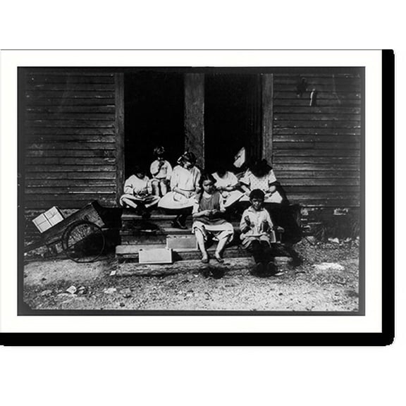 Historic Print, Group working on tags in rear of 196 Highland Street, Roxbury Mass. See Home Work report. Location: Roxbury, Massachusetts., 16" x 20"