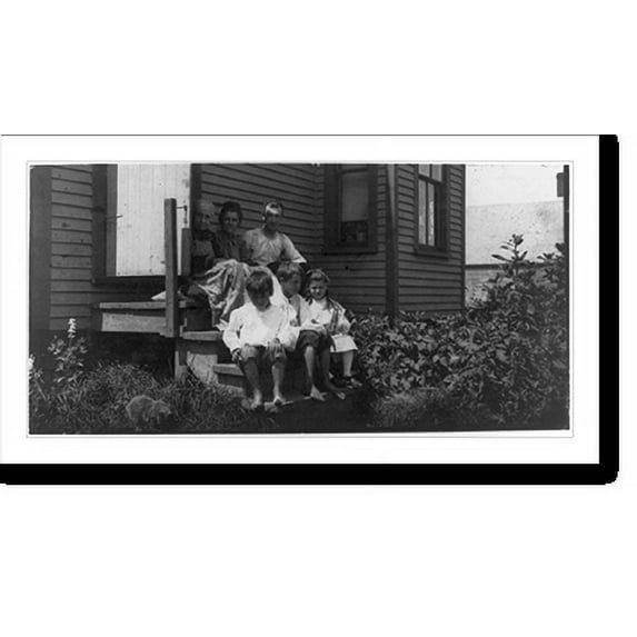 Historic Print, Hamilton Family, sardine works, Eastport. Father earns $15 to $25 a week irregularly during the work season for three months. Said that 20 years ago he made $5 a day as ...18" x 24"