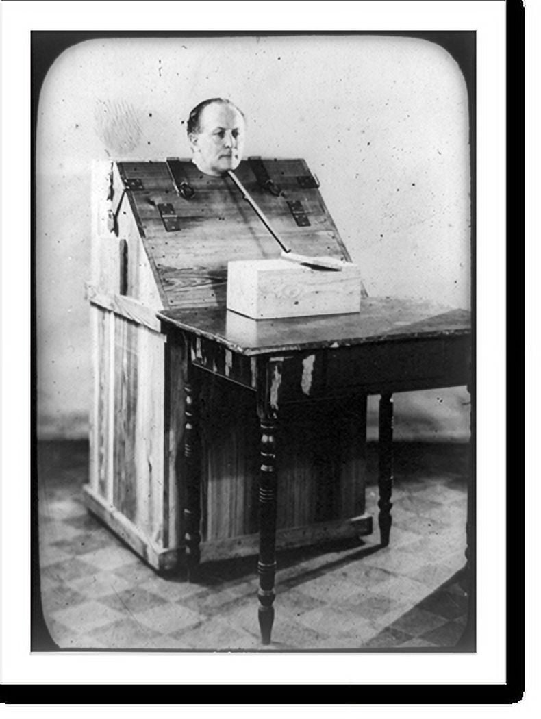 Historic Print, [Harry Houdini in wooden box with only his head